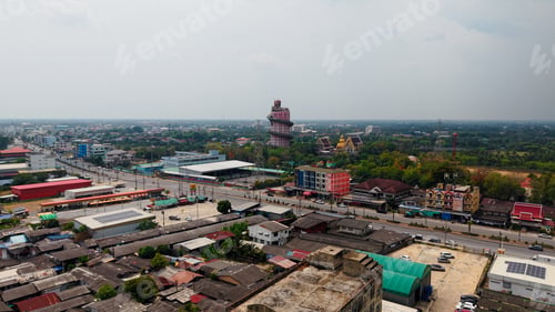 Preview: Wat sam phran dragon temple rising into cloudy sky with surrounding cityscape