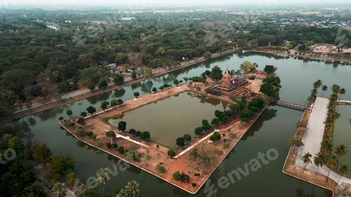 Preview: Sukhothai historical park aerial view displaying ancient stupa and tranquil moats