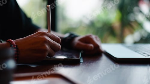 Preview: Close-Up of Hands Drawing with Stylus on Tablet at Workspace
