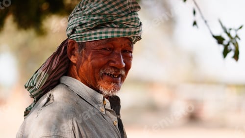 Preview: Portrait of a happy elder man smiling, showing wisdom and cultural tradition