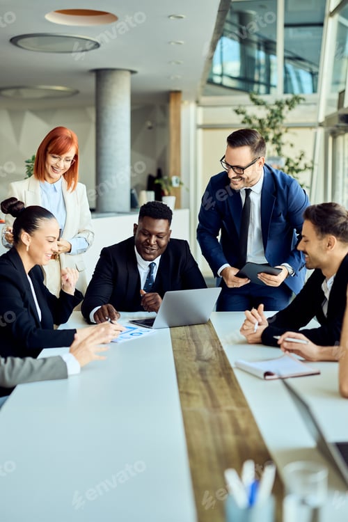 Preview: Team of Professionals Collaborating During a Meeting in a Modern Office Environment
