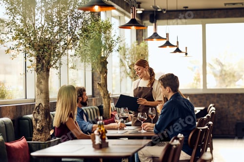 Preview: Waitress Taking Order from Group of Friends in a Cozy Modern Restaurant Setting