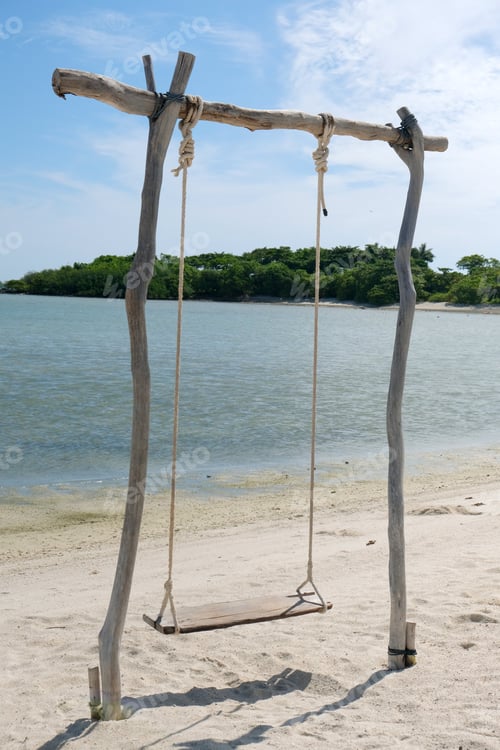 Preview: Beach swing sand sea tropical wood empty wooden swing sandy tropical beach beside calm sea, peaceful