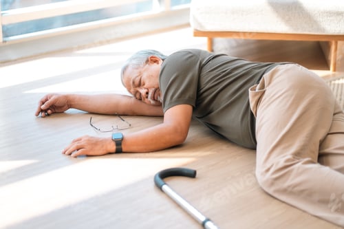 Preview: Elderly man lying on floor after fall, emergency help, injury, pain, senior adult