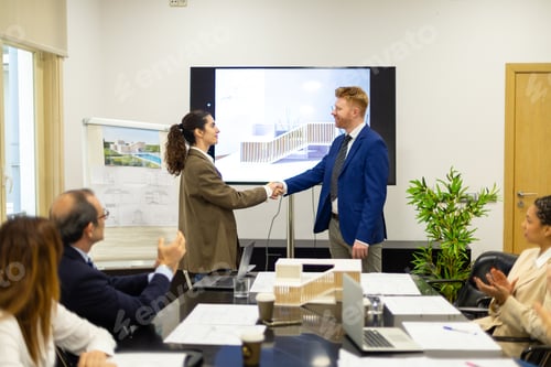 Preview: Architects partners shaking hands in business meeting