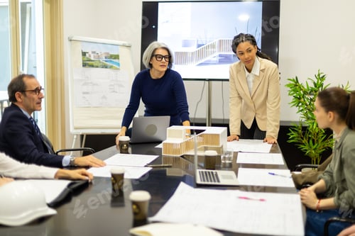 Preview: Architecture team discussing building project plans