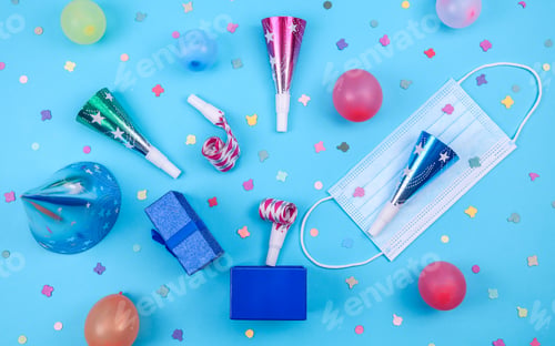 Preview: Pipes, whistles, balls, a medical mask and confetti fall out of the gift on a blue background.