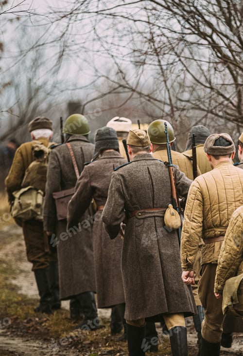 Preview: World War II Russian Soviet Red Army Soldiers Marching Through Forest. Soldier Of WWII WW2 Times