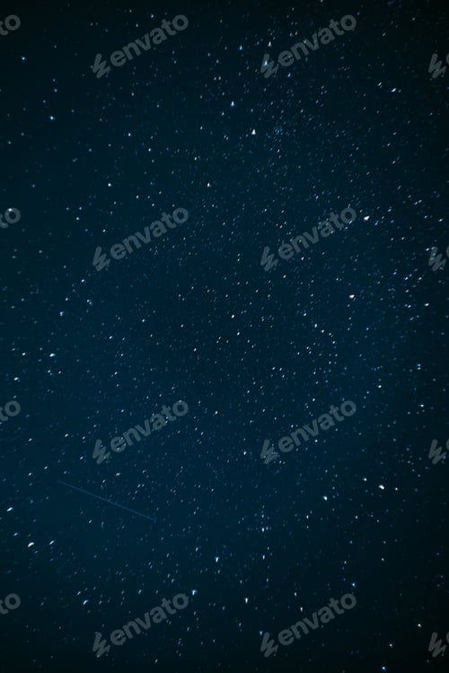 Preview: Cosmic starfield with bright stars and meteor trail