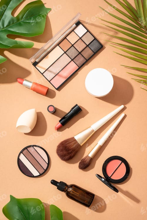 Preview: Make up products. Shadow palette with brushes, lipstick, cream and others.