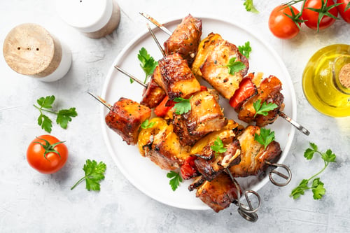 Preview: Grilled shish kebab or meat skewers with vegetables.