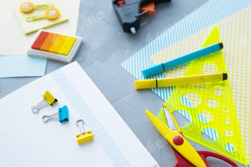 Preview: Scrapbooking - handmade art, design of a handmade photo album. Paper, office supplies, top view. Fla