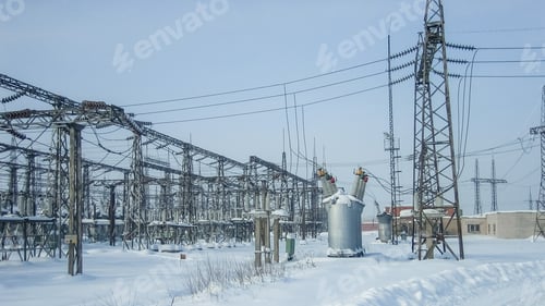 Preview: Snowy industrial landscape of electrical substation in winter. Power plant electricity infrastructur