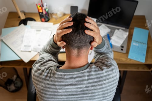 Preview: Entrepreneur feeling stress during economic crisis managing bills