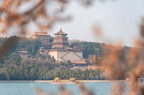 Preview: Beautiful panoramic view of ancient Chinese architecture at Summer Palace with traditional boat on t