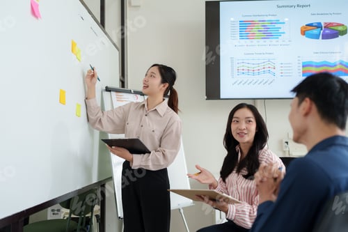 Preview: Business team collaborating during client presentation and strategy meeting