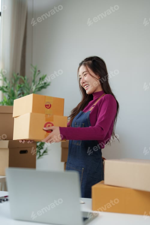 Preview: Woman shipping products from online business startup office
