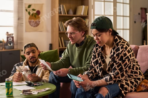 Preview: Multiethnic Students Managing Shared Budget and Expenses at Home