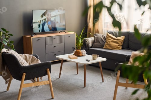 Preview: Modern Living Room Showing Television News Broadcast for Home Media