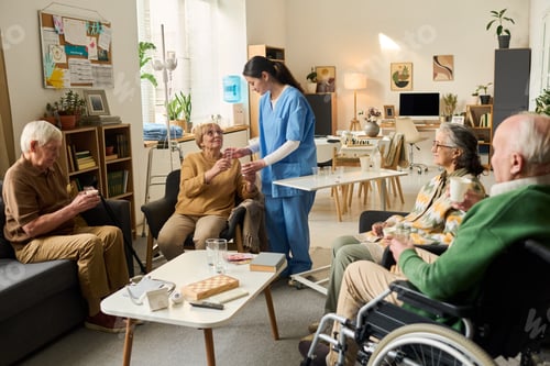 Preview: Nurse Assisting Senior Patients during Care Home Social Gathering