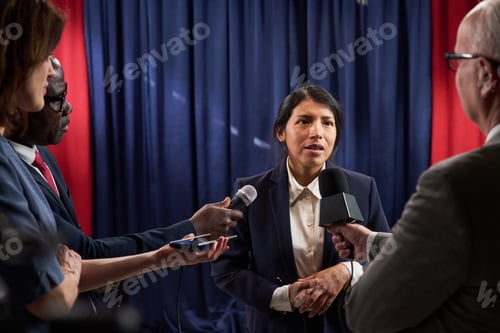Preview: Hispanic Woman Politician Answering Reporters during Press Conference