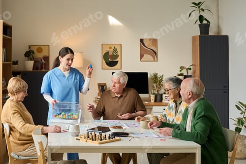 Preview: Senior Group Playing Cognitive Games with Caregiver in Nursing Home