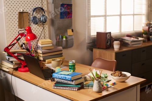 Preview: Student Study Desk Showing Laptop Books and Home Learning Setup