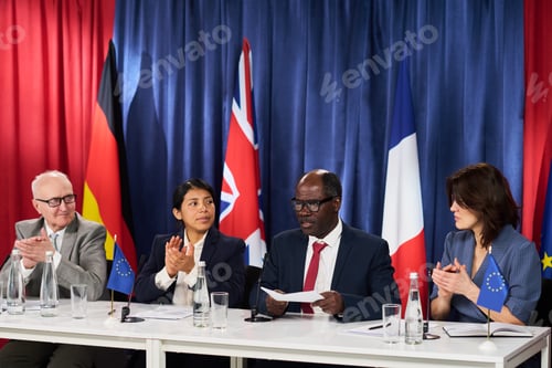 Preview: Diverse Diplomats Applauding during International Press Conference