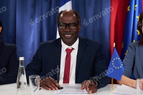 Preview: Portrait of Black Senior Diplomat Speaking at International Summit