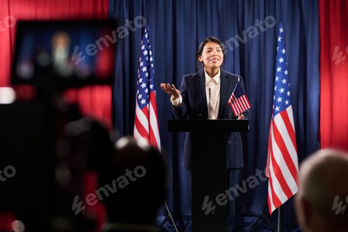 Preview: Hispanic Woman Delivering Campaign Speech at Podium