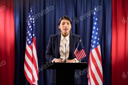 Preview: Hispanic Woman Delivering Political Speech on Stage