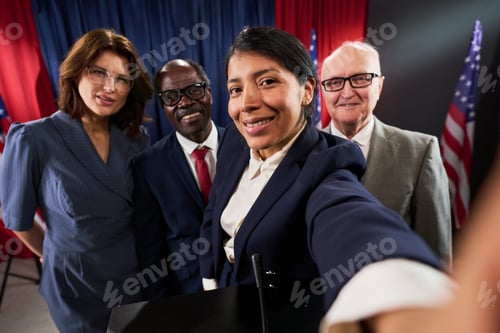 Preview: Portrait of Diverse Political Team Posing at Campaign Event