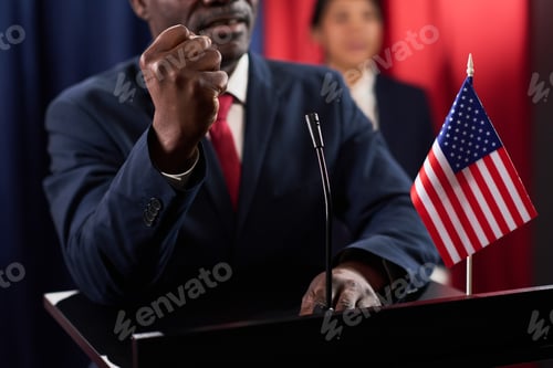 Preview: Black Man Speaking at Podium during Political Campaign Event