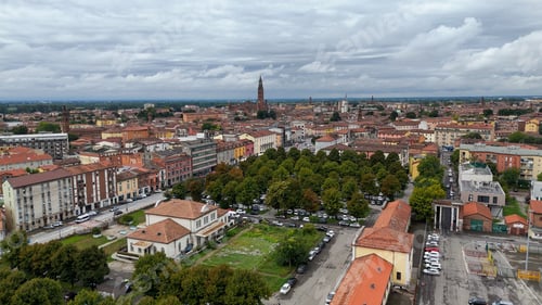Preview: Aerial panorama of Cremona cityscape with Torrazzo bell tower visible above historic architecture an