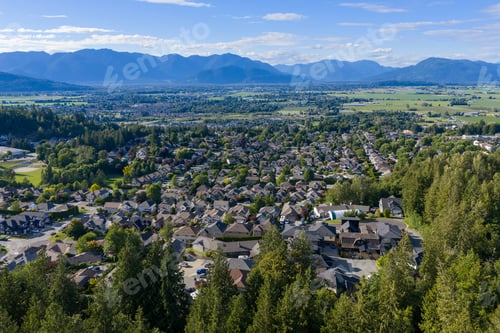 Preview: Aerial View Of Suburban Promontory Overlooking Chilliwack Valley And Mountains In British Columbia,