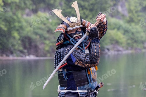 Preview: Samurai in Traditional Armor Raising Katana in Rain at Stave Lake, Mission, British Columbia