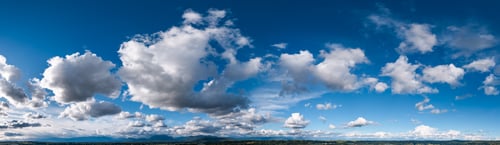 Preview: Dramatic Cloudscape Over BC Mountains: Blue Sky With Puffy Clouds and Panoramic Landscape