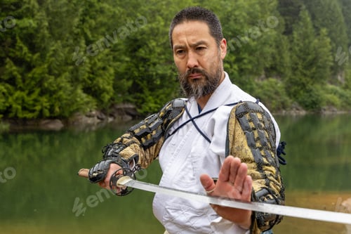 Preview: Samurai With Sword and Armor Practicing Martial Arts at Stave Lake in Mission, British Columbia, Can