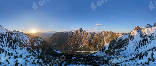 Preview: Sunset Over Snowy Mountain Valley in British Columbia, Canada — Alpine Peaks and Forested Slopes