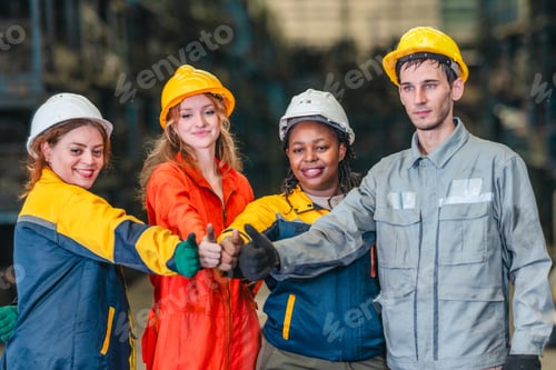 Preview: Factory Team Celebrating Teamwork in Auto Parts Warehouse