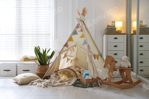 Preview: Cute wigwam with fairy lights and toys in stylish child's room