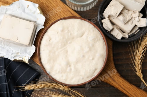 Preview: Fresh yeast dough and ingredients on wooden table, flat lay