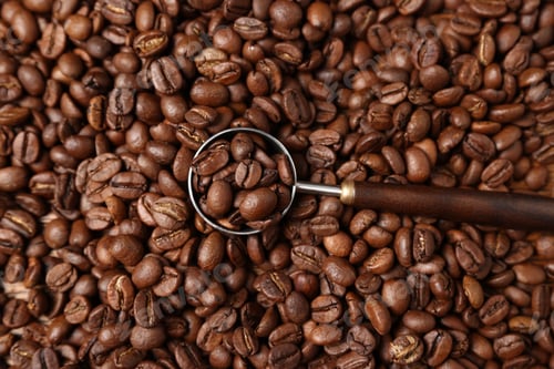 Preview: Coffee beans and scoop as background, top view