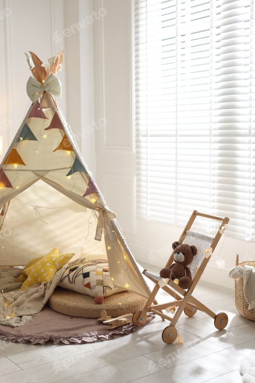 Preview: Cute wigwam with fairy lights and toys in stylish child's room