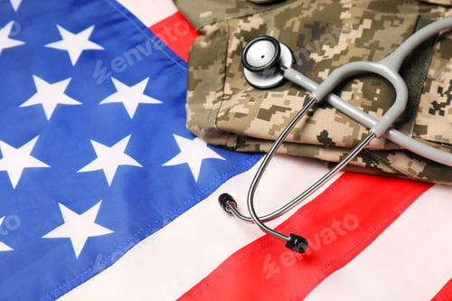 Preview: Stethoscope and military uniform on USA flag, closeup