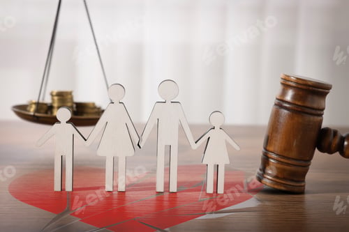 Preview: Divorce and alimony concept. Family figure and judge's gavel on table with broken heart