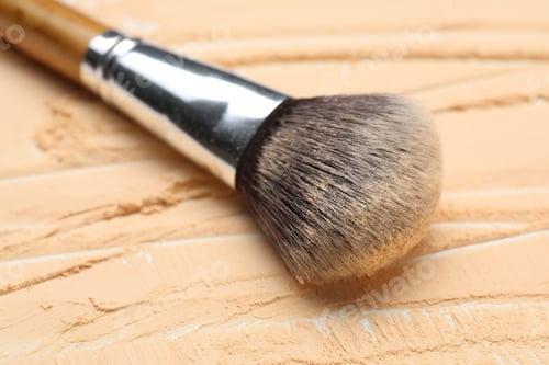 Preview: Makeup brush and loose face powder on white background, closeup