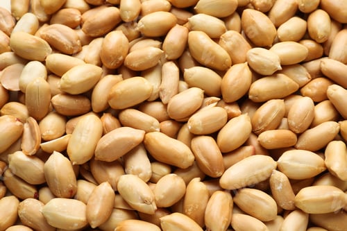Preview: Fresh peeled peanuts as background, above view
