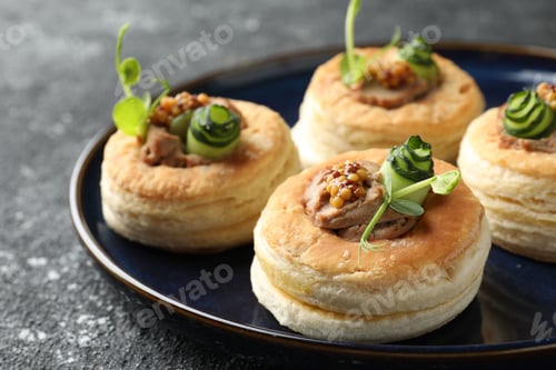 Preview: Tasty puff pastries with pate, cucumber, microgreens and whole grain mustard on grey table, closeup