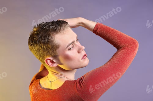 Preview: Young man with piercing in stylish shirt on color background